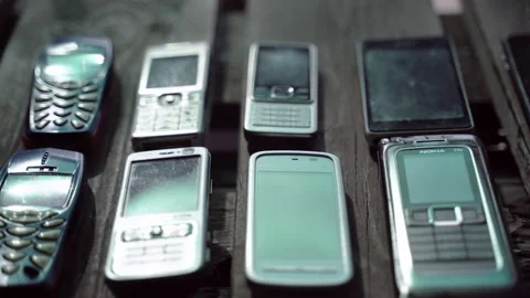 Cell phones evolution, a range of different mobile phones beginning from keypad Stock-Footage 131194309