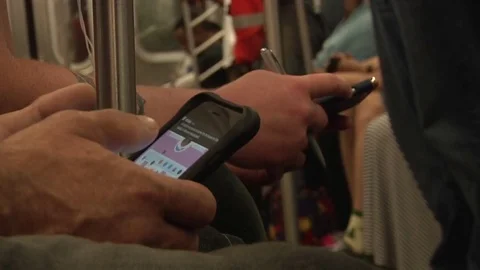 Cell Phones On Subway Car Stock Footage