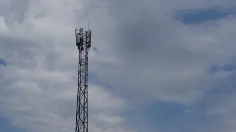 Cell tower against blue sky, new technologies Stock Footage 306167819