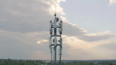 Cell tower with antennas for transmitting 3G, 4G or 5G signals Video stock 135182852