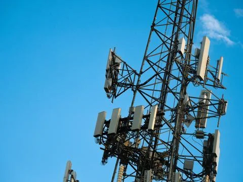 Cell tower with Blue sky backdrop Stock Photos