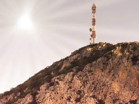 Cell tower, broadcasting mast on big mountain Stock Photos