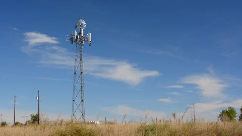 Cell Tower Disguised as a Farm Windmill Stock Footage 114347822
