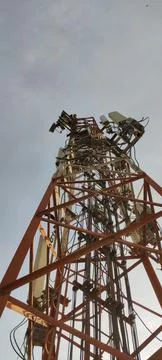Cell tower infrastructure with signal transmitters 스톡 사진