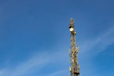 Cell Tower For Mobile Network And Internet with blue sky Stock Photos