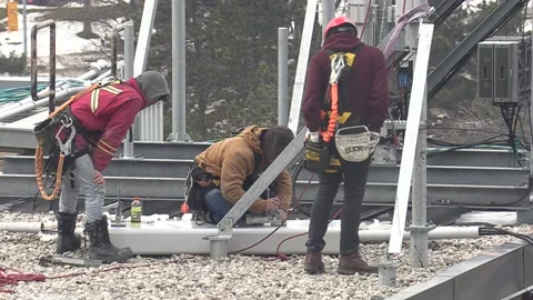 Cell tower network workers installing an... | Stock Video | Pond5