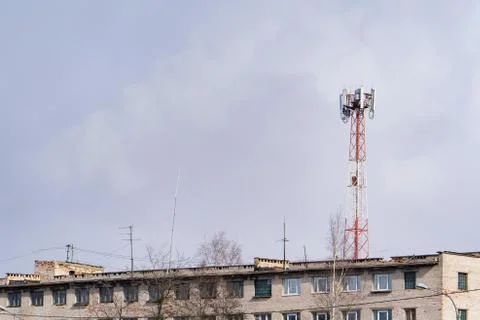 The cell tower operator on the blue sky Stock Photos