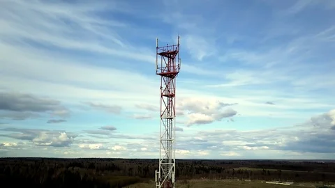 Cell tower for signal distribution over a wide area. Antennas and transmitters.  Stock Footage 121637313