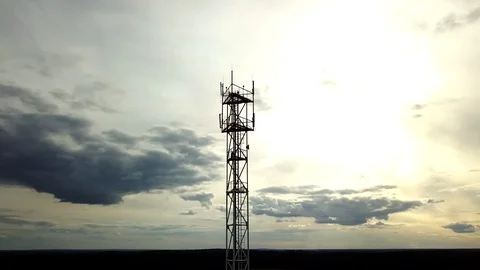 Cell tower for signal distribution over a wide area. Antennas and transmitters.  Stock Footage 121637691