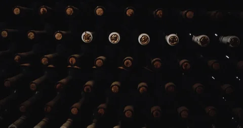 In a cellar lot of old bottles red wine without label Stock Footage 88041511