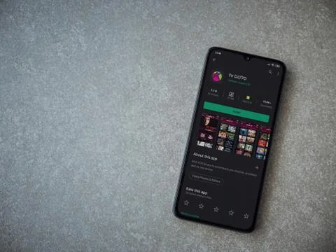 Cellcom TV app play store page on the display of a black mobile smartphone on Stock Photos