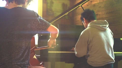 Cellist and pianist practicing classical music 스톡 동영상 130362981