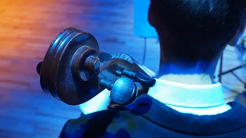 Cellist plays the cello on stage. Close up. Stock Footage 119439111