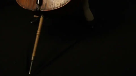 Cello on black background (pizzicato)  Stock Footage 23020227