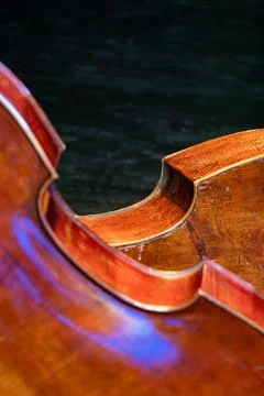 Cello closeup on dark background Stockfoto's