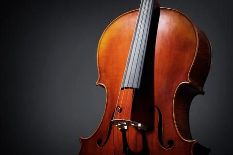 Cello on dark background Stock Photos