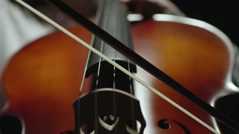 Cello player. Cellist hands playing cello with bow. Violoncello orchestra Stock Footage 162327129