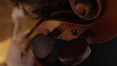 Cello player close up extreme over the shoulder Stock Footage 93527172