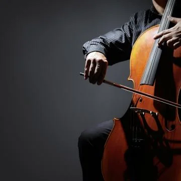 Cello player or cellist performing Stock Photos