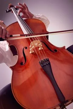 Cello player or cellist performing Stock Photos