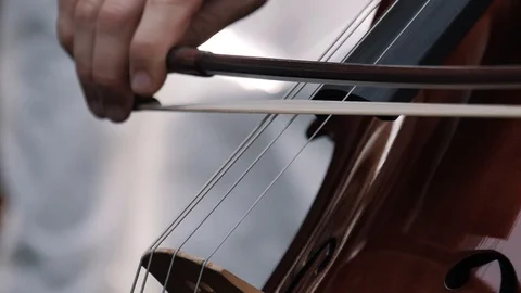 Cello Strings Being Played Closeup - Slow Motion Stock Footage 91736823
