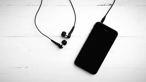 Cellphone with earphone black and white color tone style Stock Photos