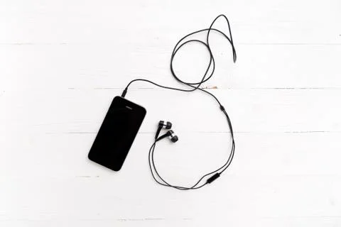 Cellphone with earphone Stock Photos