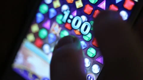 Cellphone game play Stock Footage 10993423