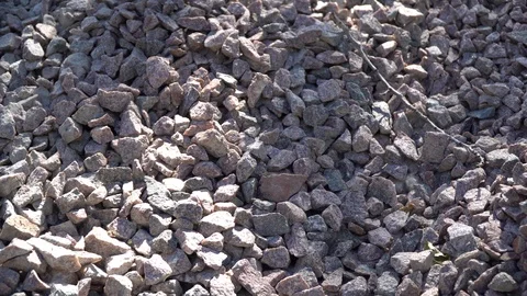 Cellphone in heap of pebble. Unbreackable touchscreen of mobile phone Stock Footage 109161793