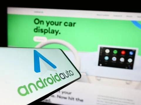  Cellphone with logo of mobile app Android Auto (Google) on screen in fron... Stock Photos