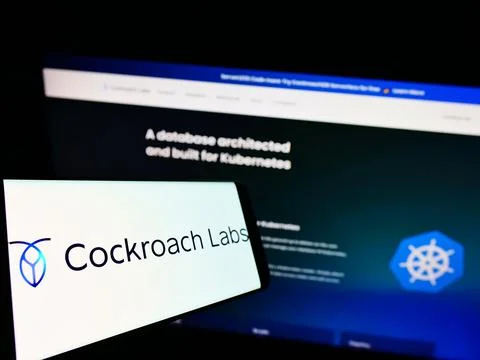 Cellphone with logo of US SQL database company Cockroach Labs Inc. on screen in Stock Photos