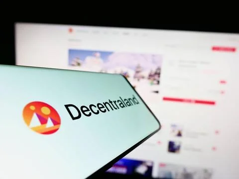 Cellphone with logo of virtual world platform Decentraland on screen in fr... Stock Photos