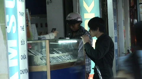 Cellphone shopping, Vietnam Stock Footage