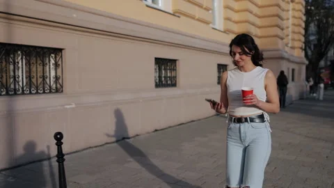 Cellphone talking, Pacing street, Java cup Stock Footage 319353034