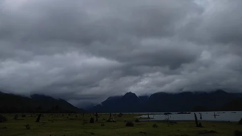 A cellphone timelapse from Clouds and mountains in Lago Chapo close to Puerto Mo Stock Footage 123048052