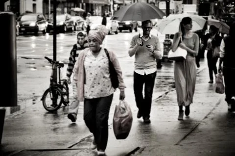Cellphone user in  NYC Stock Photos