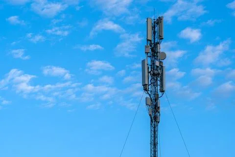 Cellular communication tower with antennas Stockfoto's
