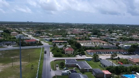 Cellular Communications Tower Within Residential Neighborhood, Bahamas Aerial Stock Footage 90105697