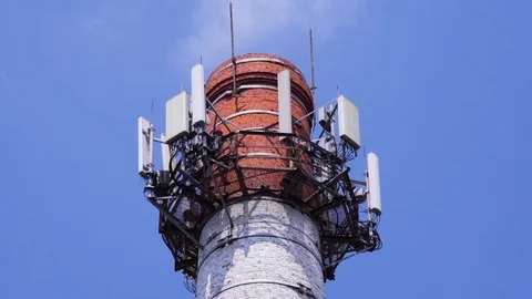 Cellular Network, Cellular Antennas on the CHPP Pipe Stock Footage 95875630
