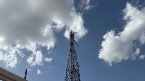 Cellular Network Tower Time Lapse with Fast Moving Clouds Under Blue Sky 스톡 동영상 331645829