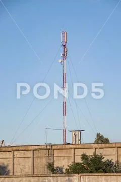Cellular repeater, mast for broadcasting wireless communication and the Inter Stock Photos