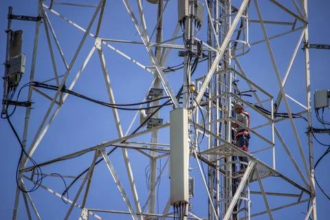 Cellular Tower with sky background Stock Photos