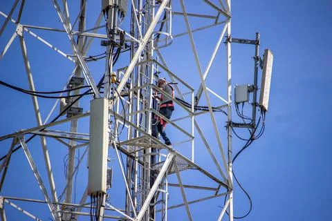 Cellular tower worker on duty Stock Photos