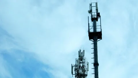Cellular Towers of Mobile Operators 3g 5g Cellular Communication Tower and Time  Stock Footage 219854779