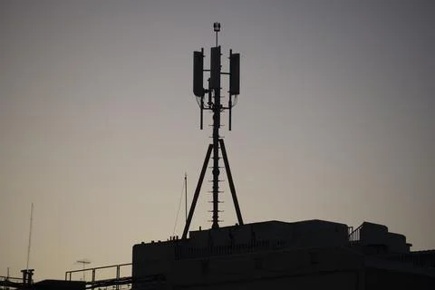 Cellular transmitters on top of building Stock Photos