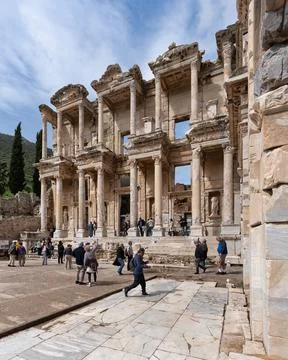 Celsus Library, Ephesus, Turkey. Ancient Roman facade with tourists exploring Stock Photos