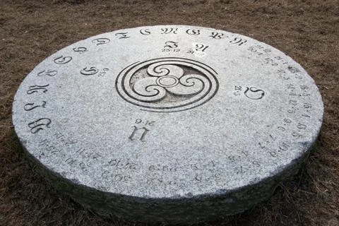 Celtic calendar on circular stone Stock Photos