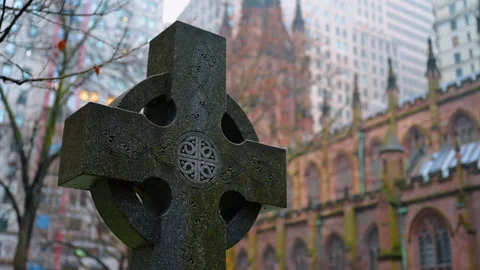 Celtic cross headstone in Trinity Church graveyard New York Stock Footage 330061625