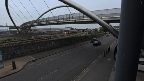 Celtic gateway bridge time lapse traffic speeding under stainless steel arched Vídeos de archivo 339094666