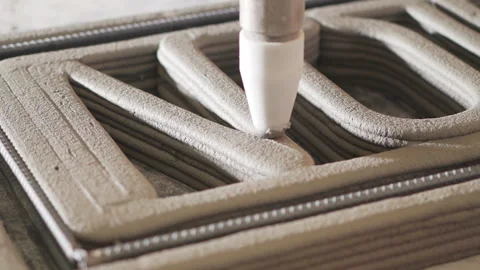 Cement 3D Printing printing N sign pan shot 50fps Video stock 246372010